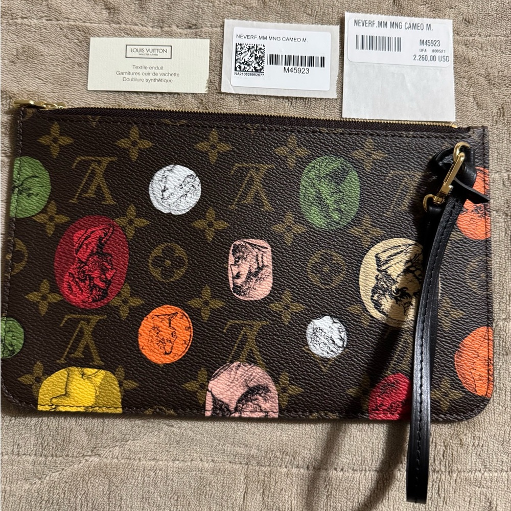SOLD!!! Louis Vuitton Brown and Red Monogram Wristlet
